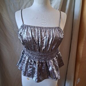 Old Navy silver metallic top with adjustable straps and ruffle hem. Size: L